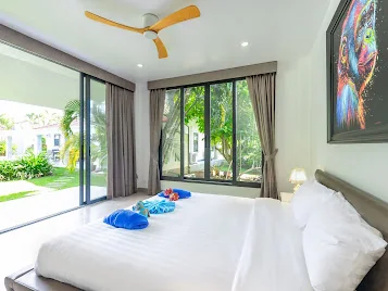 Corner garden-view bedroom
